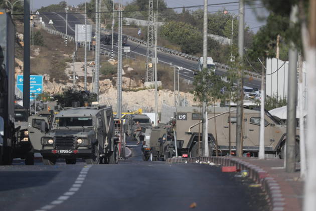 Israeli forces kill two Palestinians in Farsh Al Hawa area of Hebron HEBRON, WEST BANK, PALESTINE - OCTOBER 23: Israeli forces stand guard in the Farsh Al Hawa area at the northern entrance to Hebron after Israeli soldiers shot and killed two Palestinians alleging they had launched an attack targeting Israelis in the vicinity before sealing off the area with military security cordons in West Bank, Palestine on October 23, 2026. Mamoun Wazwaz Anadolu Hebron West Bank. Editorial use only. Please get in touch for any other usage.  Copyright: x2026xAnadoluxMamounxWazwazx