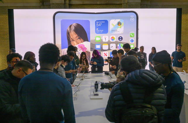 October 23, 2026, London, London, UK: London, UK. Customers inside the Apple Covent Garden store view and buy the new Apple iPhone Duo, the companyâ€⠢s first foldable iPhone. Opened, it is the thinnest iPhone ever, with a 7.6-inch inner display that provides a large canvas for viewing content, gaming, and multitasking, and a special nano-texture finish that minimises glare for an unparalleled viewing experience. Closed, the 5.4-inch outer display delivers 90 percent of the screen area of iPhone 18 Pro in a compact, pocketable design. London UK - ZUMAl94_ 20261023_zaf_l94_014 Copyright: xRayxTangx