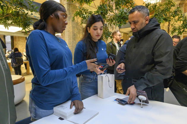 October 23, 2026, London, London, UK: London, UK. Customers inside the Apple Covent Garden store view and buy the new Apple iPhone Duo, the companyâ€⠢s first foldable iPhone. Opened, it is the thinnest iPhone ever, with a 7.6-inch inner display that provides a large canvas for viewing content, gaming, and multitasking, and a special nano-texture finish that minimises glare for an unparalleled viewing experience. Closed, the 5.4-inch outer display delivers 90 percent of the screen area of iPhone 18 Pro in a compact, pocketable design. London UK - ZUMAl94_ 20261023_zaf_l94_024 Copyright: xRayxTangx