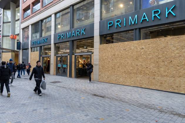 Storefronts boarded up with wooden panels at Rue Neuve Nieuwstraat, in Brussels, on Friday 23 October 2026. Stores are preparing for another protest scheduled for Saturday.  NICOLASxMAETERLINCK 190739534