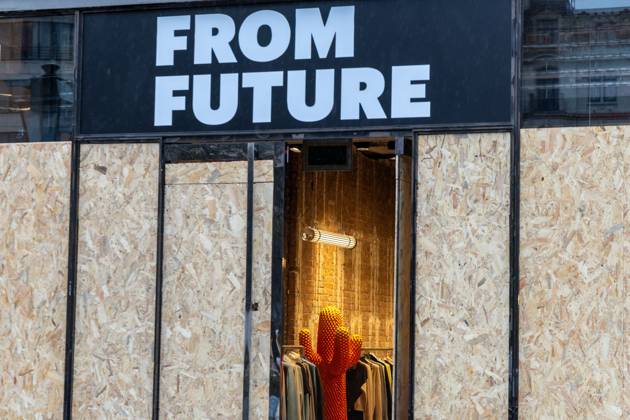 Storefronts boarded up with wooden panels, in Brussels, on Friday 23 October 2026. Stores are preparing for another protest scheduled for Saturday.  NICOLASxMAETERLINCK 190744584