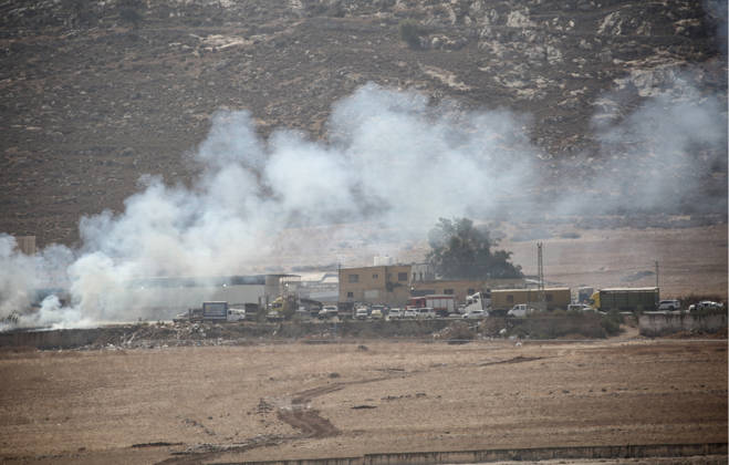 October 23, 2026, Nablus, West Bank, Palestine: Israeli soldiers fire tear gas toward Palestinian vehicles at a checkpoint near the city of Nablus in the West Bank. The Israeli military imposed a security cordon around all areas under the control of the Palestinian Authority—led by Mahmoud Abbas—following a shooting incident near the city of Hebron. This comes after Israeli Prime Minister Benjamin Netanyahu ordered a full security lockdown across the West Bank and the city of Hebron. Nablus Palestine - ZUMAs197 20261023_aaa_s197_069 Copyright: xNasserxishatyehx