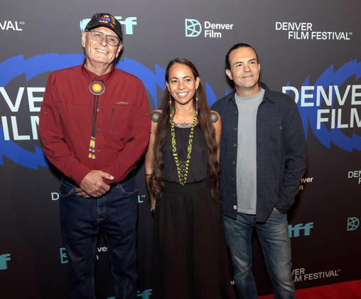 October 23, 2026, Denver, Colorado, USA: Producer RICK WILLIAMS, Director DEWI SUNGAI MARQUIS-HOUSTON, and Cinematographer JASON HOUSTON of the film People of the Sacred Land pose for a group photo during the 49th. Denver Film Festival Red Carpet event at the Ellie Caulkins Opera House Thursday night. Credit Image: ZUMA Press Wire) Denver USA - ZUMAav4_ 20261023_zaf_av4_013 Copyright: xHectorxAcevedox