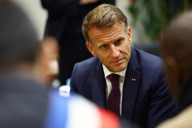 French President Macron in Trappes After Deadly Shooting - France French President Emmanuel Macron speaks with community members at the town hall after a drive-by shooting during which a person was killed and at least four others were wounded including a 12-year-old girl, in Trappes, in the Yvelines department, near Paris, France, October 23, 2026. Photo by Hannah McKay Pool ABACAPRESS.COM Trappes France  Copyright: xMcKayxHannah Pool ABACAx