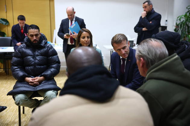 French President Macron in Trappes After Deadly Shooting - France French President Emmanuel Macron speaks with community members at the town hall after a drive-by shooting during which a person was killed and at least four others were wounded including a 12-year-old girl, in Trappes, in the Yvelines department, near Paris, France, October 23, 2026. Photo by Hannah McKay Pool ABACAPRESS.COM Trappes France  Copyright: xMcKayxHannah Pool ABACAx