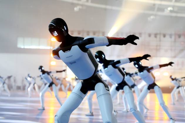 JINAN, CHINA - OCTOBER 24: One hundred and ten Zhiyuan Yuanzheng A3 humanoid robots perform a synchronized formation dance to set a Guinness World Record on October 24, 2026 in Jinan, Shandong Province of China. The event took place at the Yellow River International Convention and Exhibition Center.  Copyright: xVCGx 111676700371
