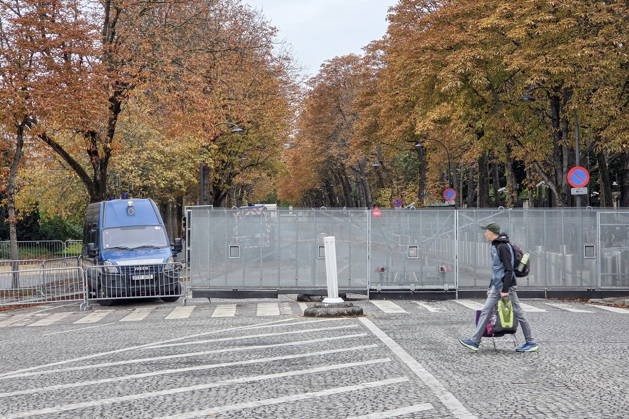 FRANCE, PARIS - OCTOBER 24, 2026: A pedestrian crosses a blocked street. Security measures have been tightened in the French capital as mass protests involving trade unions and university students are expected. Dmitry Orlov TASS  99860457
