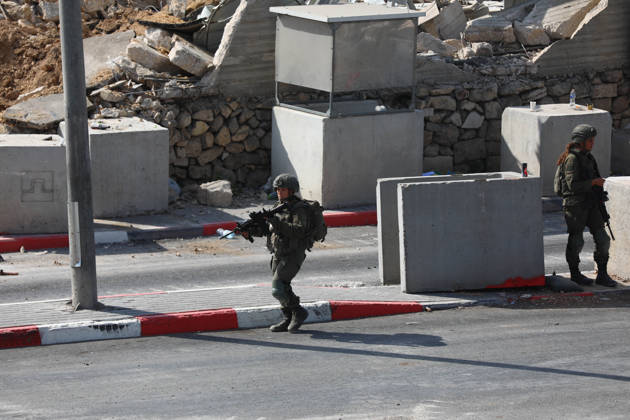 Palestinian homes in the ??Hebron destroyed following a clash at a checkpoint HEBRON, WEST BANK, PALESTINE - OCTOBER 24: Israeli forces take security measures at the Farsh Al Hawa military checkpoint, where Palestinian homes and structures have been demolished byby Israeli army heavy machinery in Hebron, West Bank, Palestine on Saturday, October 24, 2026. The demolitions followed a deadly shootout at the local checkpoint involving two Palestinians and two Israeli soldiers, leading to a total lockdown of Hebron and surrounding communities. Wisam Hashlamoun Anadolu Hebron West Bank. Editorial use only. Please get in touch for any other usage.  Copyright: x2026xAnadoluxWisamxHashlamounx