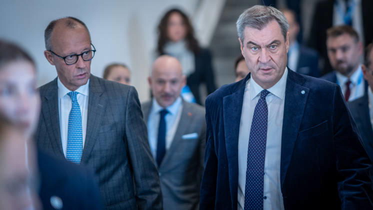 Chancellor Friedrich Merz speaks here alongside CSU Party Chairman Markus Söder on their way to Exhibition Hall C6 at the CSU Party Convention in Munich, Munich, Bavaria, Germany, Munich Exhibition Center