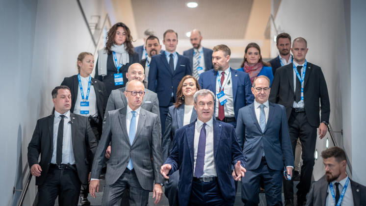 Chancellor Friedrich Merz speaks here alongside CSU Party Chairman Markus Söder on their way to Exhibition Hall C6 ahead of the CSU Party Convention in Munich, with Franziska Hoppermann, Alexander Dobrindt, and Alexander Hoffmann. CSU Party Convention in Munich, Munich, Bavaria, Germany, Munich Exhibition Center