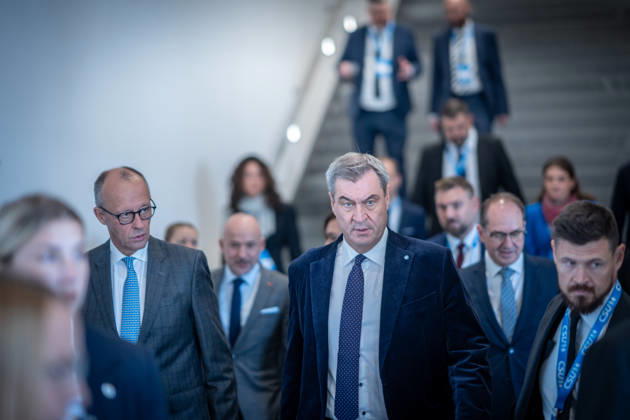 Chancellor Friedrich Merz speaks here alongside CSU Party Chairman Markus Söder on their way to Exhibition Hall C6 at the CSU Party Convention in Munich, Munich, Bavaria, Germany, Munich Exhibition Center