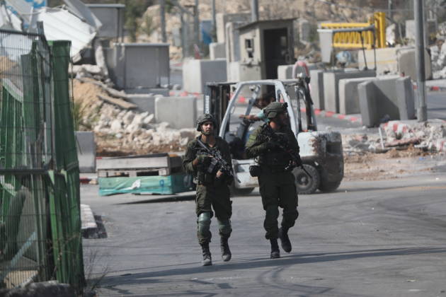Israeli Soldiers and Military Vehicles Deployed Near Checkpoint in Hebron Israeli soldiers and military vehicles are deployed near a checkpoint where a shooting attack took place in the West Bank city of Hebron, on October 24, 2026. The deployment comes amid continuing Israeli military operations and heightened security measures in the area. Photo by Mamoun Wazwaz apaimages Hebron West Bank Palestinian Territory 241026_Hebron_MW_04(24) Copyright: xapaimagesxMamounxWazwazx xapaimagesx