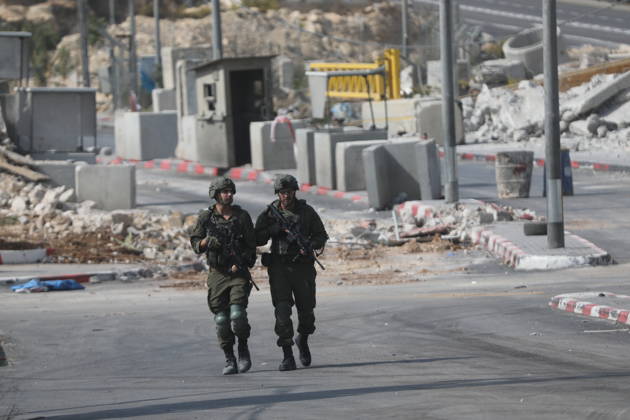 Israeli Soldiers and Military Vehicles Deployed Near Checkpoint in Hebron Israeli soldiers and military vehicles are deployed near a checkpoint where a shooting attack took place in the West Bank city of Hebron, on October 24, 2026. The deployment comes amid continuing Israeli military operations and heightened security measures in the area. Photo by Mamoun Wazwaz apaimages Hebron West Bank Palestinian Territory 241026_Hebron_MW_04(23) Copyright: xapaimagesxMamounxWazwazx xapaimagesx