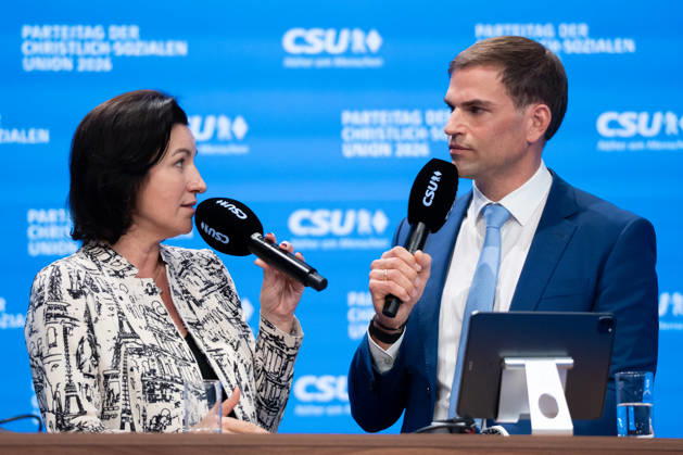 Munich, Bavaria, Germany October 24, 2026: Day 2 of the 2026 CSU (Christian Social Union) Party Convention at the Munich Trade Fair Center. Dorothee Bär (Member of the Bundestag, Federal Minister of Research, Technology, and Space of the Federal Republic of Germany) and Maximilian Böltl (Member of the State Parliament) on stage