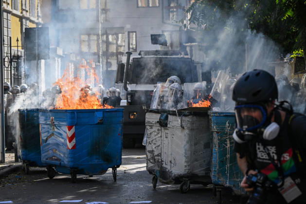 Mass Anti-Government National Protest in Tirana TIRANA, ALBANIA - OCTOBER 24: Thick smoke and intense flames erupt from public trash bins turned into barricades on a central street on October 24, 2026, in Tirana, Albania. Unrest and physical confrontations erupt in Tirana city center as demonstrators and riot police clash during a massive nationwide protest, turning the capital s main avenue into a major flashpoint as chaotic skirmishes broke out between security forces and factions of the crowd. Artur Widak Anadolu Tirana Albania. Editorial use only. Please get in touch for any other usage.  Copyright: x2026xAnadoluxArturxWidakx