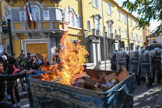 Mass Anti-Government National Protest in Tirana TIRANA, ALBANIA - OCTOBER 24: A large dumpster fire burns on a city street as a cordon of riot police holding shields forms a protective barrier in the background on October 24, 2026, in Tirana, Albania. Unrest and physical confrontations erupt in Tirana city center as demonstrators and riot police clash during a massive nationwide protest, turning the capital s main avenue into a major flashpoint as chaotic skirmishes broke out between security forces and factions of the crowd. Artur Widak Anadolu Tirana Albania. Editorial use only. Please get in touch for any other usage.  Copyright: x2026xAnadoluxArturxWidakx