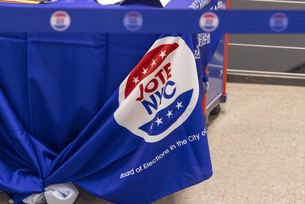 October 24, 2026, New York, New York, USA: A table cover is labeled VOTE NYC at the Borough of Manhattan Community College polling site in Tribeca where lower Manhattan residents vote on the first day of early voting for the midterm elections in New York. New York USA - ZUMAr174 20261024_znp_r174_023 Copyright: xGinaxMxRandazzox