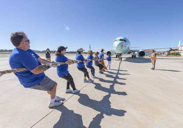 October 24, 2026, Santa Barbara, California, USA: Teams compete in the 5th annual Alpha Resource Center Plane Pull, trying to pull a 140,000-pound Alaska Airlines 737 jetliner 20 feet in the fastest time. The event is a fundraiser for the Alpha Resource Center, a nonprofit serving people with disabilities and their families. Santa Barbara USA - ZUMAh13_ 20261024_zaf_h13_004 Copyright: xPJxHellerx
