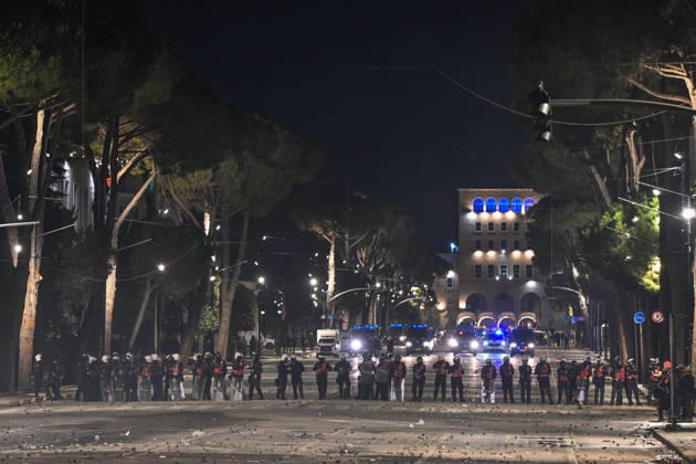 Mass Anti-Government National Protest in Tirana TIRANA, ALBANIA - OCTOBER 24: A long line of riot police officers completely blocks a massive tree-lined boulevard backed by multiple flashing police vehicles at night near the Prime Minister Office, on October 24, 2026, in Tirana, Albania. Unrest and physical confrontations erupt in Tirana city center as demonstrators and riot police clash during a massive nationwide protest, turning the capital s main avenue into a major flashpoint as chaotic skirmishes broke out between security forces and factions of the crowd. Artur Widak Anadolu Tirana Albania. Editorial use only. Please get in touch for any other usage.  Copyright: x2026xAnadoluxArturxWidakx