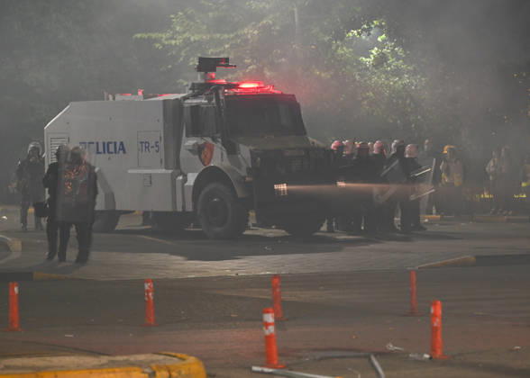 Mass Anti-Government National Protest in Tirana TIRANA, ALBANIA - OCTOBER 24: An armored police vehicle with flashing red lights remains stationed amidst dense smoke and nearby riot squads on October 24, 2026, in Tirana, Albania. Unrest and physical confrontations erupt in Tirana city center as demonstrators and riot police clash during a massive nationwide protest, turning the capital s main avenue into a major flashpoint as chaotic skirmishes broke out between security forces and factions of the crowd. Artur Widak Anadolu Tirana Albania. Editorial use only. Please get in touch for any other usage.  Copyright: x2026xAnadoluxArturxWidakx