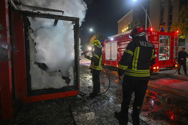 Mass Anti-Government National Protest in Tirana TIRANA, ALBANIA - OCTOBER 24: Firefighters in full protective gear spray water into a heavily damaged, smoke-filled structure next to a parked firetruck on October 24, 2026, in Tirana, Albania. Unrest and physical confrontations erupt in Tirana city center as demonstrators and riot police clash during a massive nationwide protest, turning the capital s main avenue into a major flashpoint as chaotic skirmishes broke out between security forces and factions of the crowd. Artur Widak Anadolu Tirana Albania. Editorial use only. Please get in touch for any other usage.  Copyright: x2026xAnadoluxArturxWidakx