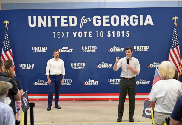 October 24, 2026, Atlanta, Georgia, USA: Jon Ossoff and Pete Buttigieg Knock Doors in Atlanta, Georgia. November 24, 2026 Atlanta USA  - ZUMAs380 20261024_zep_s380_049 Copyright: xDerekxStormx