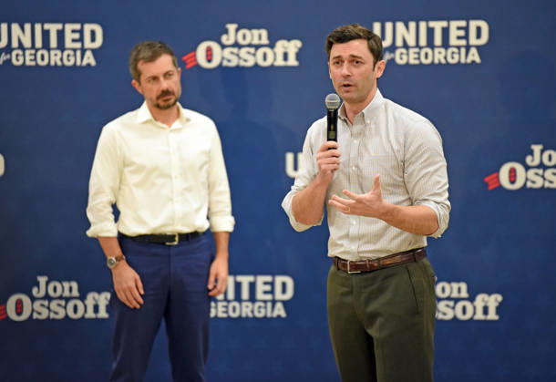 October 24, 2026, Atlanta, Georgia, USA: Jon Ossoff and Pete Buttigieg Knock Doors in Atlanta, Georgia. November 24, 2026 Atlanta USA  - ZUMAs380 20261024_zep_s380_046 Copyright: xDerekxStormx