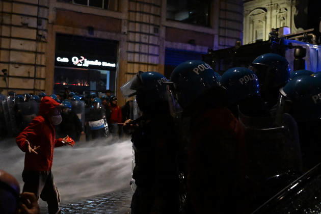 Demonstration against the government in Rome ROME, ITALY - OCTOBER 24: Police officers and water cannon vehicles block a road as anti-government protesters attempt to march toward the prime minister s office, on October 24, 2026 in Rome, Italy. Demonstrators taking part in the protest came face to face with security forces as police prevented them from advancing. Baris Seckin Anadolu Rome Italy. Editorial use only. Please get in touch for any other usage.  Copyright: x2026xAnadoluxBarisxSeckinx