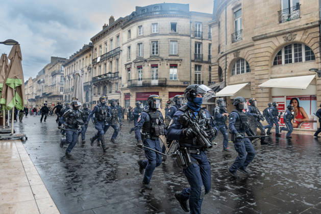 October 24, 2026, Bordeaux, Nouvelle-Aquitaine, France: In Bordeaux, the march on the second day of protests against the rising cost of living initially proceeded peacefully. At the end of the route, violent clashes broke out on the sidelines between groups of demonstrators and law enforcement officers. Projectiles were thrown at riot police, who used tear gas to disperse the groups. Participants in the mobilization also included members of the Yellow Vests movement. Bordeaux France - ZUMAh207 20261024_zip_h207_030 Copyright: xFabricexHebertx