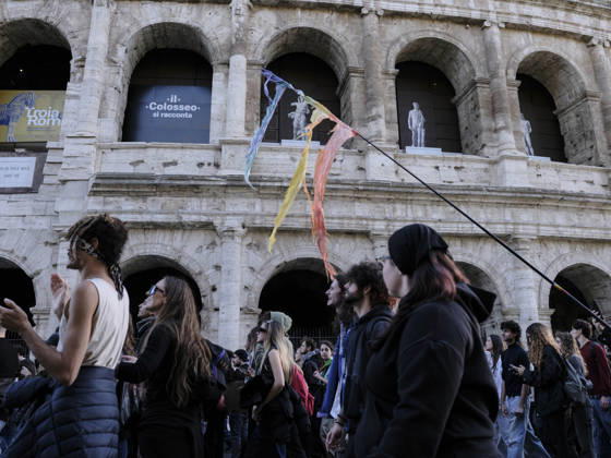 Rome Anti War Protest Demonstrators march outside the Colosseum during an anti-war protest in Rome, Italy on October 24, 2026. Demonstrators took part in an anti-war march under the slogan Keep Italy Out of the War . Protesters further voiced opposition to Italy s involvement in armed conflicts, military rearmament and government policies. Rome Lazio Italy Copyright: xAndreaxCalandrax