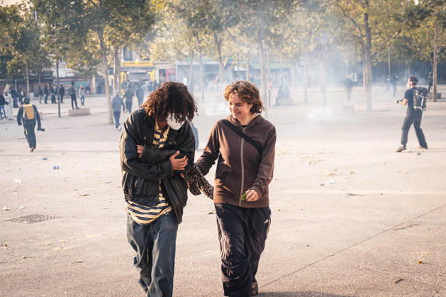 Marseille France Street Protests Two demonstrators walk amid smoke during a protest in Marseille, France on October 24, 2026. Authorities deployed around 70,000 security personnel across France for renewed protests over the cost of living, after unrest a week earlier saw public buildings damaged, hundreds of shops looted and about 2,700 people arrested. Marseille Provence-Alpes-CÃ te France Copyright: xNaelxChahinex