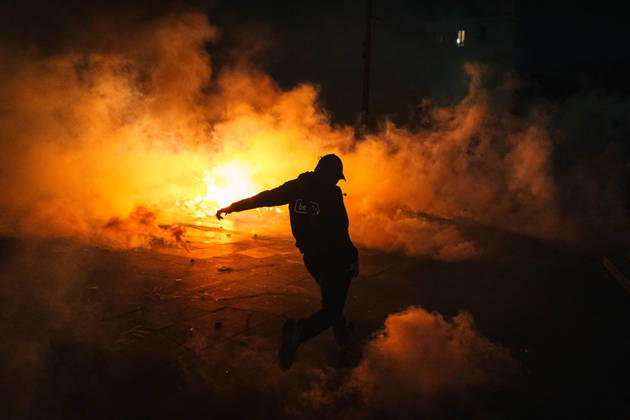 Marseille France Street Protests A demonstrator moves amid smoke during a protest in Marseille, France on October 24, 2026. Authorities deployed around 70,000 security personnel across France for renewed protests over the cost of living, after unrest a week earlier saw public buildings damaged, hundreds of shops looted and about 2,700 people arrested. Marseille Provence-Alpes-CÃ te France Copyright: xNaelxChahinex