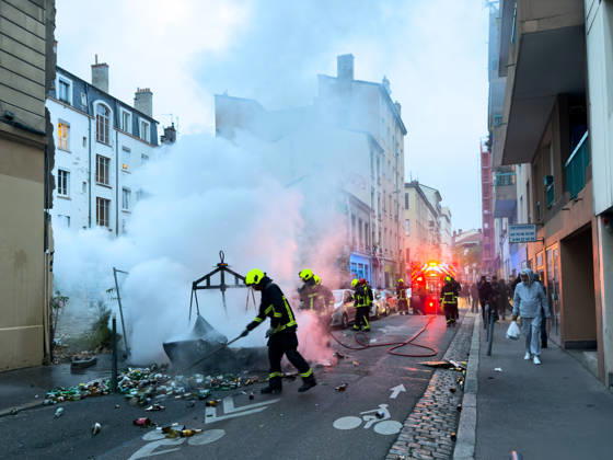 Lyon France Protests October 24 Firefighters extinguish a fire during a protest in Lyon, France on October 24, 2026. Authorities deployed around 70,000 security personnel across France for renewed protests over the cost of living, after unrest a week earlier saw public buildings damaged, hundreds of shops looted and about 2,700 people arrested. Lyon Rhone Alpes France Copyright: xAbolfazlxSalmanzadehx