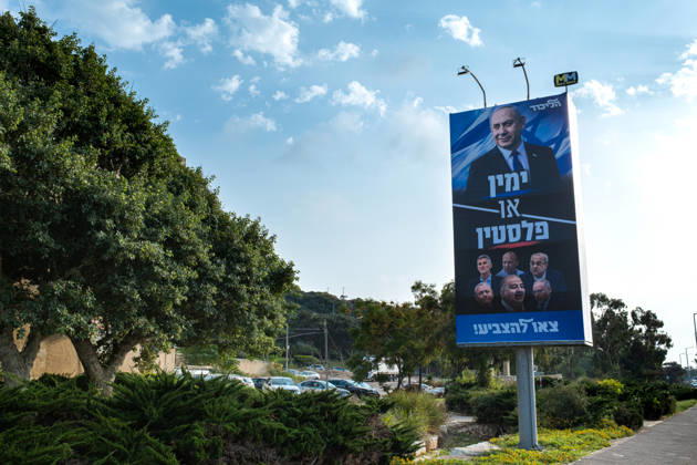 2026 Elections in Israel, Haifa, October 24, 2026. A large-format election poster for Benjamin Netanyahu’s Likud Party on a highway. The slogan reads: The Right or Palestine—Go Vote. Below it are portraits of the political opposition: Yair Golan (The Democrats), Naftali Bennett (BeYachad), Ah