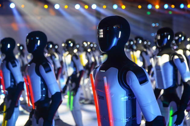 JINAN, CHINA - OCTOBER 24: One hundred and ten domestic humanoid robots perform a simultaneous dance to challenge for the Guinness World Record for most robots dancing simultaneously at Jinan Huanghe International Convention and Exhibition Center on October 24, 2026 in Jinan, Shandong Province of China. The event was organized by AgileX Robotics.  Copyright: xVCGx 111676793328