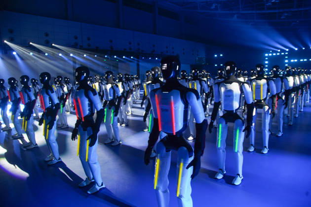 JINAN, CHINA - OCTOBER 24: 110 domestic humanoid robots perform a synchronized dance to challenge for the Guinness World Record for most robots dancing simultaneously at Jinan Huanghe International Convention and Exhibition Center on October 24, 2026 in Jinan, Shandong Province of China.  Copyright: xVCGx 111676793329
