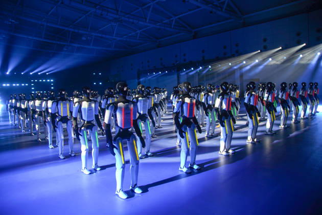 JINAN, CHINA - OCTOBER 24: One hundred and ten domestic humanoid robots perform a synchronized dance to challenge for the Guinness World Record for most robots dancing simultaneously at Jinan Yellow River International Convention and Exhibition Center on October 24, 2026 in Jinan, Shandong Province of China. The event was organized by AgileX Robotics.  Copyright: xVCGx 111676793325