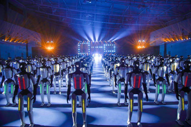 JINAN, CHINA - OCTOBER 24: One hundred and ten domestic humanoid robots perform a synchronized dance to challenge for the Guinness World Record for most humanoid robots dancing simultaneously at the Yellow River International Convention and Exhibition Center on October 24, 2026 in Jinan, Shandong Province of China.  Copyright: xVCGx 111676793326