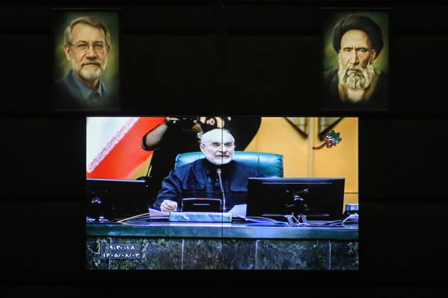 October 25, 2026, Tehran, Iran: A wall-mounted screen displays a close-up of Mohammad Bagher Ghalibaf seated at the speaker s desk beneath framed portraits at the Islamic Consultative Assembly in Tehran, Iran, on October 25, 2026. Parliamentary reports said more than two-thirds of lawmakers joined the October 25 open sitting of the Islamic Consultative Assembly, attending either in person or remotely. Tehran Iran - ZUMAi98_ 20261025_zih_i98_092 Copyright: xIcanax