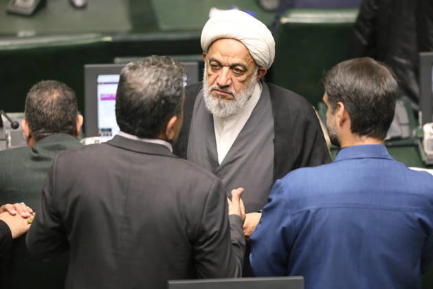 October 25, 2026, Tehran, Iran: A gray-bearded cleric in a white turban listens to three suited lawmakers gathered around his desk at the Islamic Consultative Assembly in Tehran, Iran, on October 25, 2026. The Iranian parliament held a hybrid open sitting, with some lawmakers attending in the Tehran chamber and others participating remotely, according to parliamentary reports. Tehran Iran - ZUMAi98_ 20261025_zih_i98_114 Copyright: xIcanax