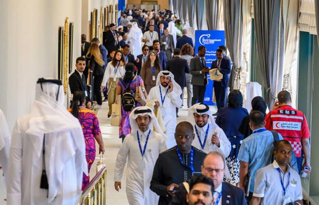 October 25, 2026, Doha, Qatar: Delegates walk through a crowded hallway during the opening day of 9th World Investment Forum (WIF 2026). The three-day summit, organized by United Nations Conference on Trade and Development Doha Qatar - ZUMAs197 20261025_aaa_s197_087 Copyright: xNoushadxVariyattiyakkalx