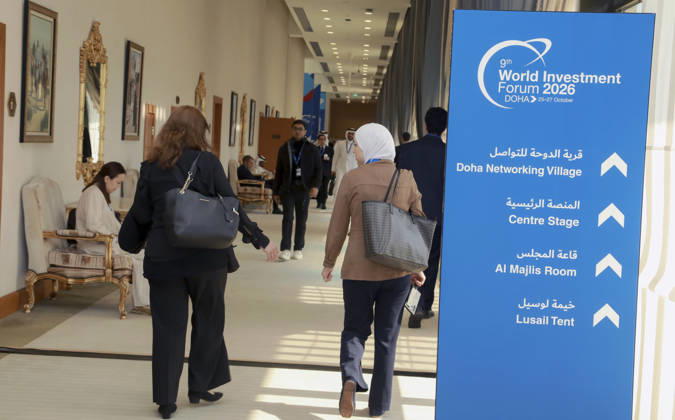 Doha Qatar World Investment Forum Participants walk along a corridor beside signs directing visitors to the World Investment Forum meeting rooms at the Sheraton Convention Center in Doha, Qatar, on October 25, 2026. The ninth World Investment Forum, organized by UN Trade and Development (UNCTAD) and hosted by Qatar from October 25 to 27 under the theme Investing in the Future, brings together government officials, investors and business leaders to discuss international investment, sustainable development and economic resilience. Doha Baladiyat ad Dawhah Qatar Copyright: xSidhickxKannurx