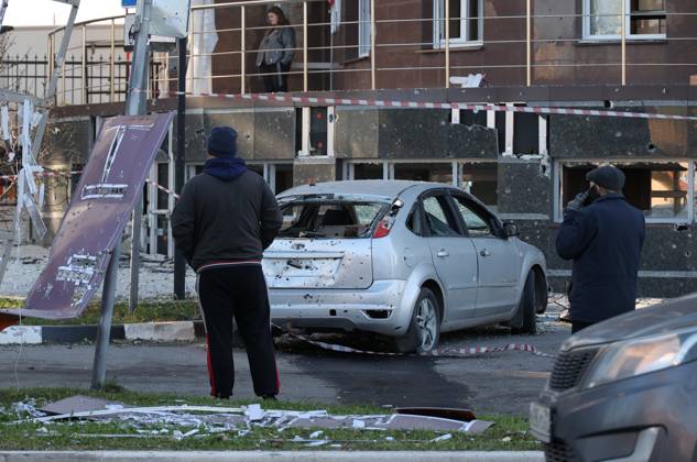 Russia Ukraine Drone Attack 9273057 25.10.2026 People stand outside a residential building damaged in a massive drone attack amid Russia s military operation in Ukraine, in Belgorod, Russia. Two persons were killed and 14 others were injured in a reported strike by the Ukrainian Armed Forces on October 25. Taisia Liskovets Sputnik Belgorod Russia  Copyright: xTaisiaxLiskovetsx