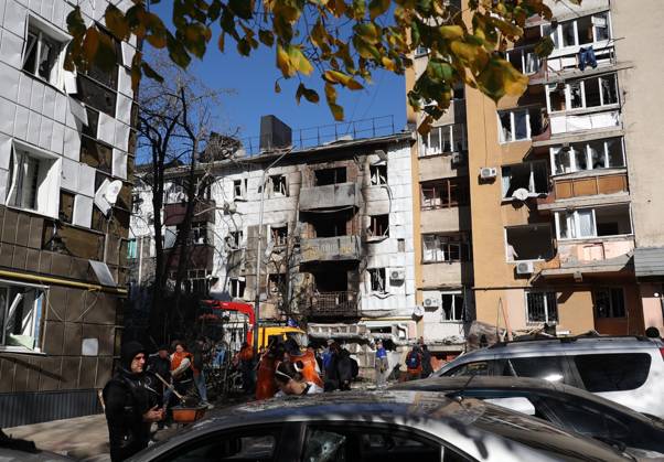 Russia Ukraine Drone Attack 9273080 25.10.2026 People stand outside residential buildings damaged in a massive drone attack amid Russia s military operation in Ukraine, in Belgorod, Russia. Two persons were killed and 14 others were injured in a reported strike by the Ukrainian Armed Forces on October 25. Taisia Liskovets Sputnik Belgorod Russia  Copyright: xTaisiaxLiskovetsx