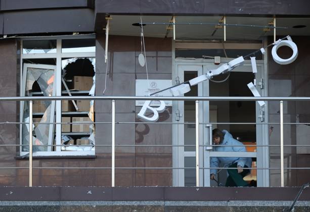 Russia Ukraine Drone Attack 9273027 25.10.2026 A woman clears debris in a residential building damaged in a massive drone attack amid Russia s military operation in Ukraine, in Belgorod, Russia. Two persons were killed and 14 others were injured in a reported strike by the Ukrainian Armed Forces on October 25. Taisia Liskovets Sputnik Belgorod Russia  Copyright: xTaisiaxLiskovetsx