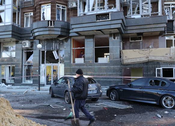 Russia Ukraine Drone Attack 9273031 25.10.2026 A man clears debris outside a residential building damaged in a massive drone attack amid Russia s military operation in Ukraine, in Belgorod, Russia. Two persons were killed and 14 others were injured in a reported strike by the Ukrainian Armed Forces on October 25. Taisia Liskovets Sputnik Belgorod Russia  Copyright: xTaisiaxLiskovetsx