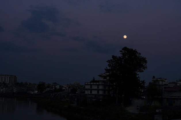 Nearly Full Moon Rises Over Kathmandu KATHMANDU, NEPAL October 25, 2026: The nearly full moon is seen in the night sky over Kathmandu, Nepal. ahead of the full moon on October 26. The bright moon illuminates the night sky, offering a striking celestial view over the Nepalese capital. (Photo by ap tolang Nexpher Images) kathmandu bagmati
