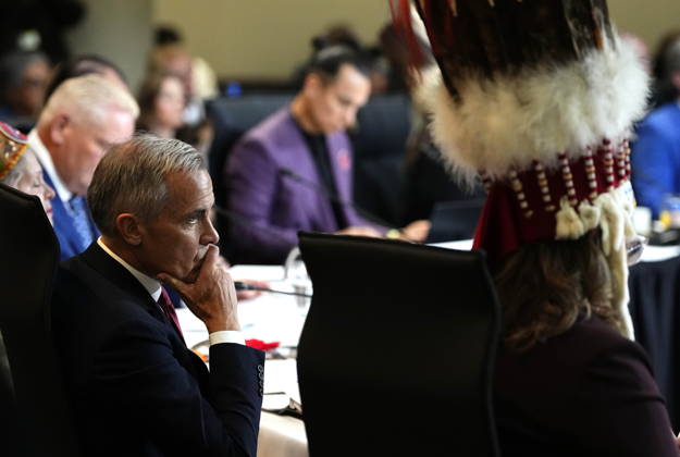 October 26, 2026, Ottawa, On, CAN: Prime Minister Mark Carney and National Chief of the Assembly of First Nations Cindy Woodhouse Nepinak, right, listen to opening remarks during a First Nations and First Ministers Meeting in Ottawa, on Monday, Oct. 26, 2026. Ottawa CAN  - ZUMAc35_ 20261026_zaf_c35_053 Copyright: xJustinxTangx