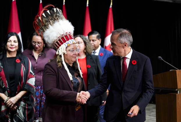 October 26, 2026, Ottawa, On, Canada: Prime Minister Mark Carney shakes hands with Assembly of First Nations National Chief Cindy Woodhouse Nepinak after a news conference at the conclusion of a First Nations and First Ministers meeting in Ottawa, on Monday, Oct. 26, 2026. Ottawa Canada  - ZUMAc35_ 20261026_zaf_c35_134 Copyright: xJustinxTangx