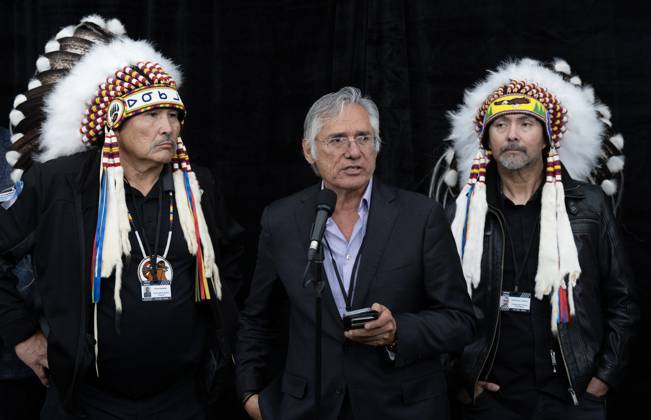 October 26, 2026, Ottawa, On, Canada: Prince Albert Grand Council Grand Chief Brian Hardlotte, left, and Cumberland House Cree Nation Chief Rene Chaboyer look on as former national chief Matthew Coon Come speaks during a break at the First Nations and First Ministers meeting in Ottawa, Monday, Oct. 26, 2026. Ottawa Canada  - ZUMAc35_ 20261026_zaf_c35_151 Copyright: xAdrianxWyldx